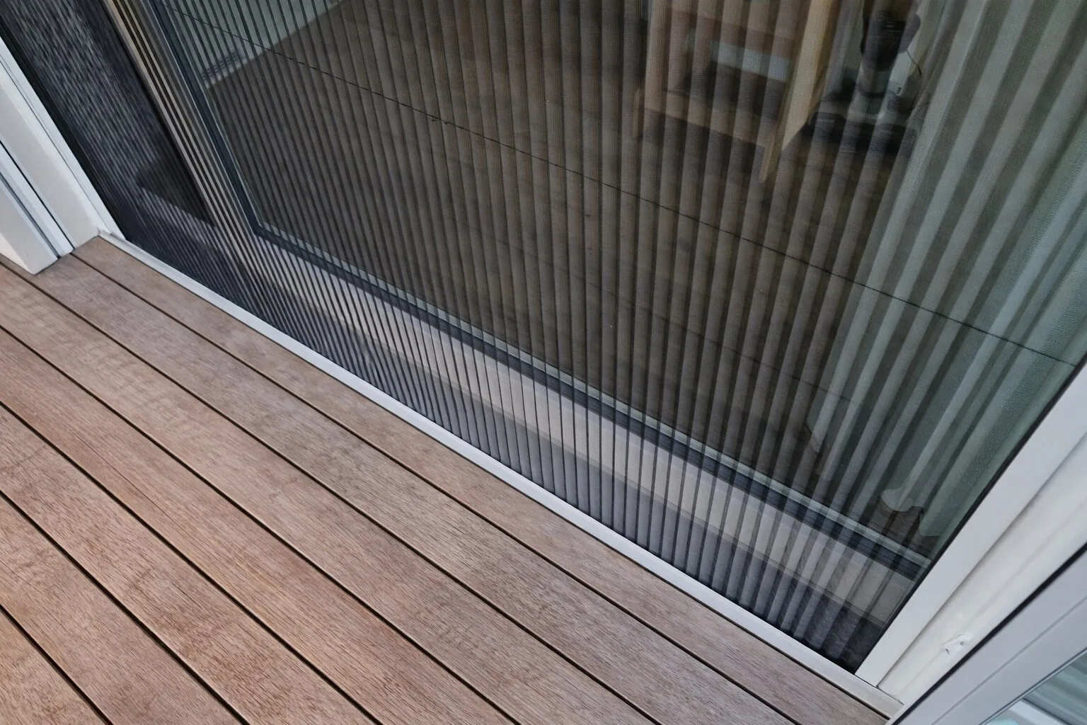 Retractable fly screen on sliding or bifold door Melbourne — We Inspire Blinds