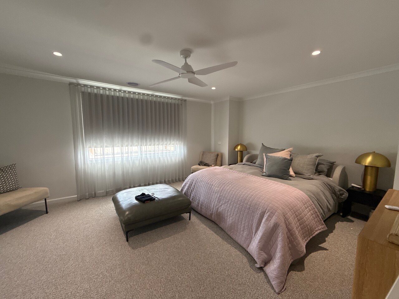 Roller blinds and curtains in a bedroom — contemporary Melbourne home