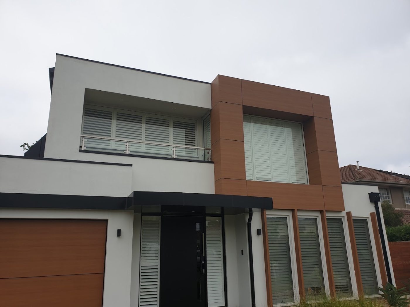 Louvre plantation shutters on a Melbourne home's street-side windows