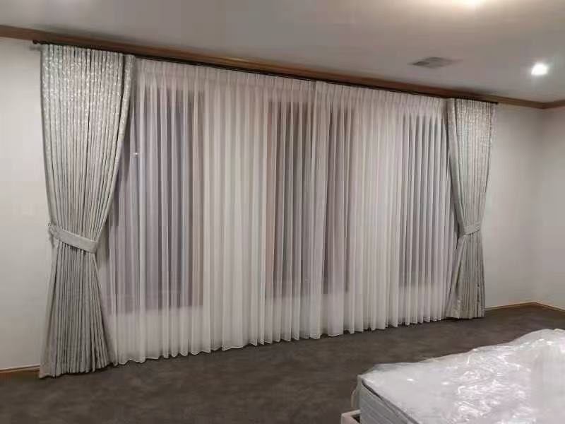 Blockout curtains for total darkness in a Melbourne bedroom