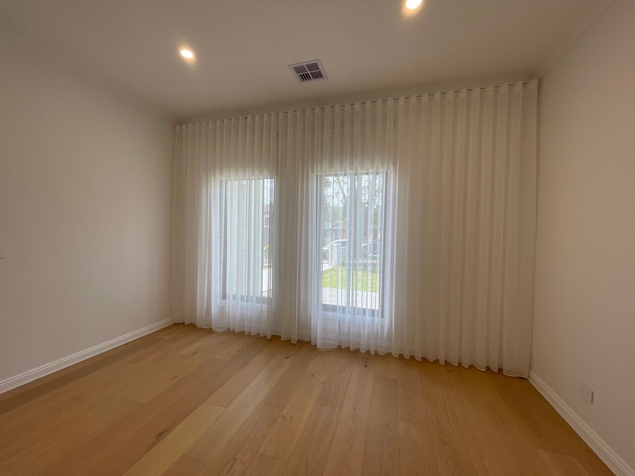 Curtains in a bedroom — Melbourne property
