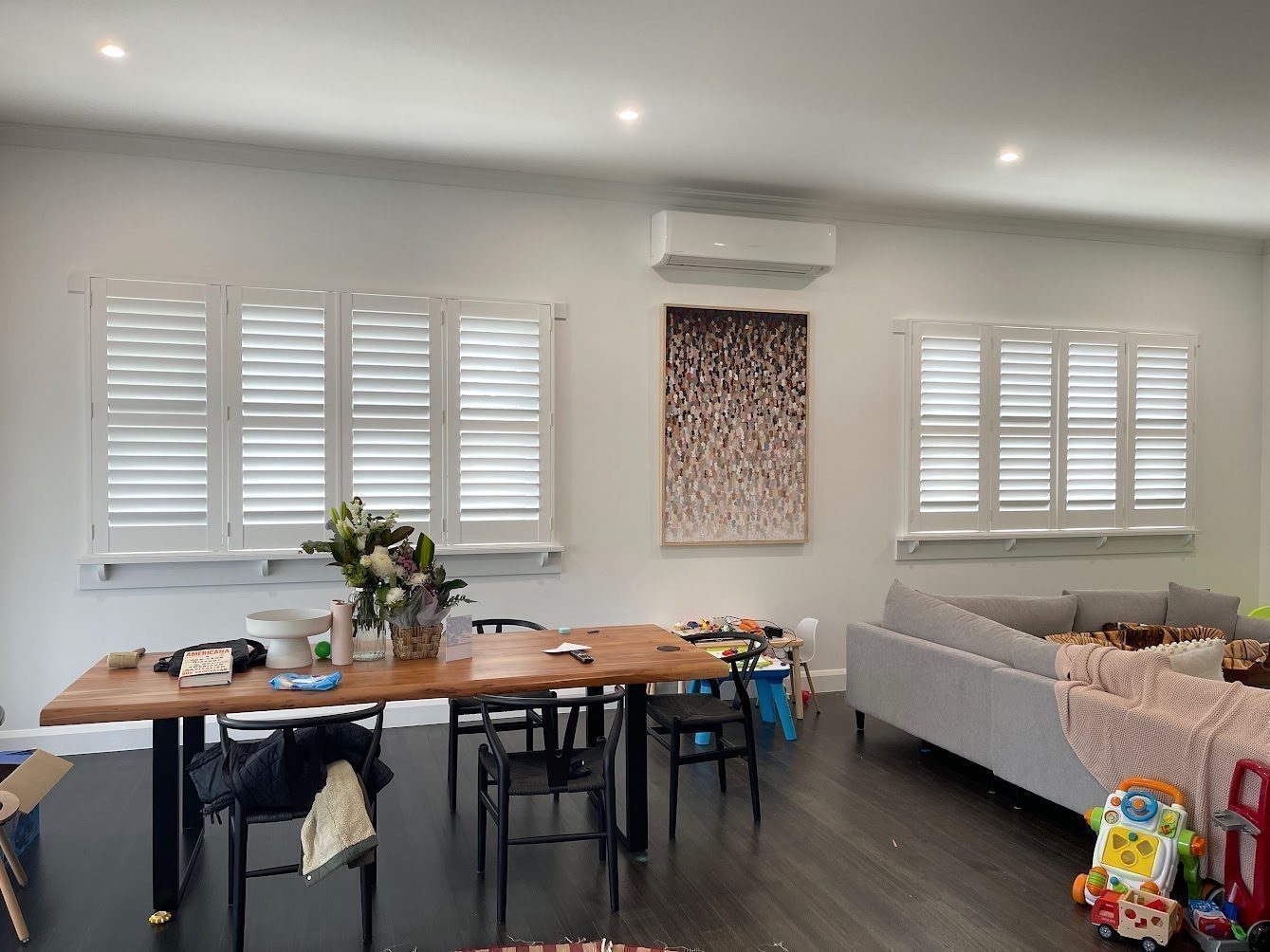Plantation shutters in a living room — modern Melbourne home