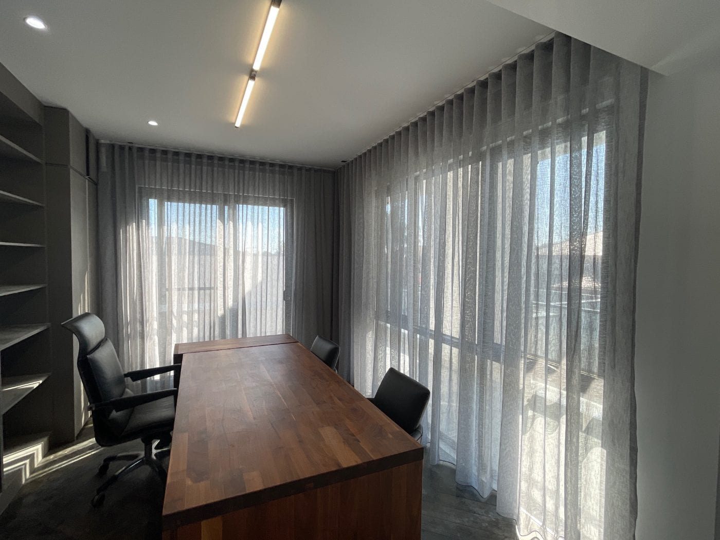 Floor-to-ceiling curtains in a Melbourne home study