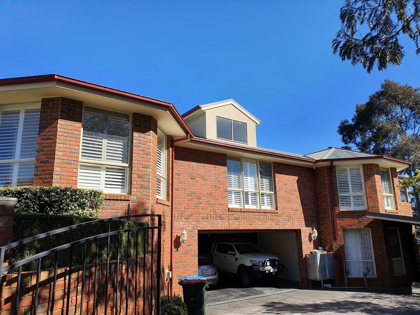 White plantation shutters on a single-storey Melbourne home exterior