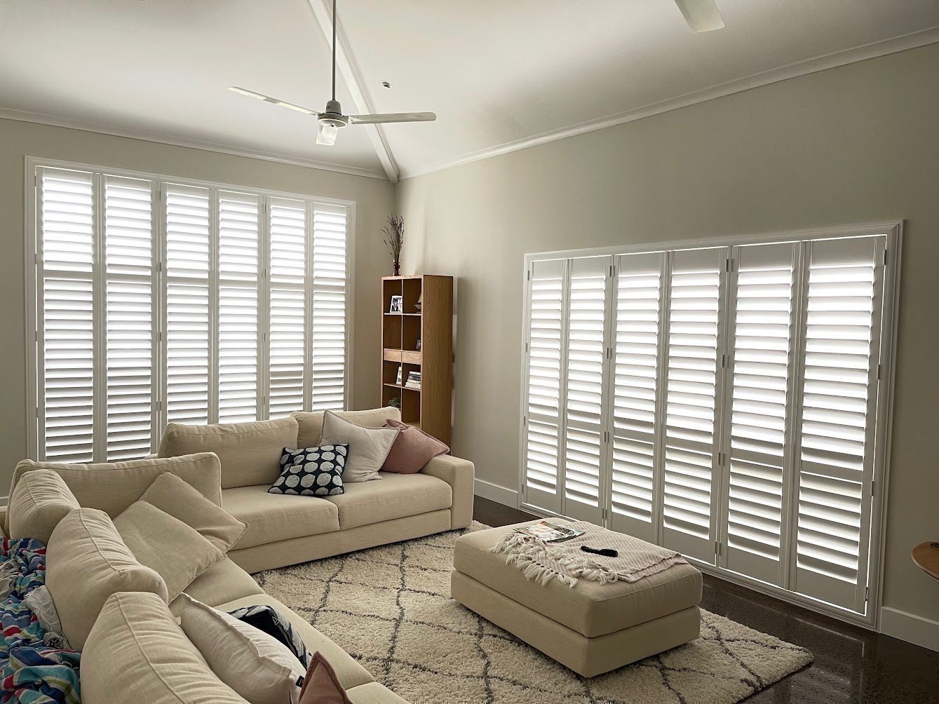 Indoor plantation shutters in a living area — Melbourne townhouse