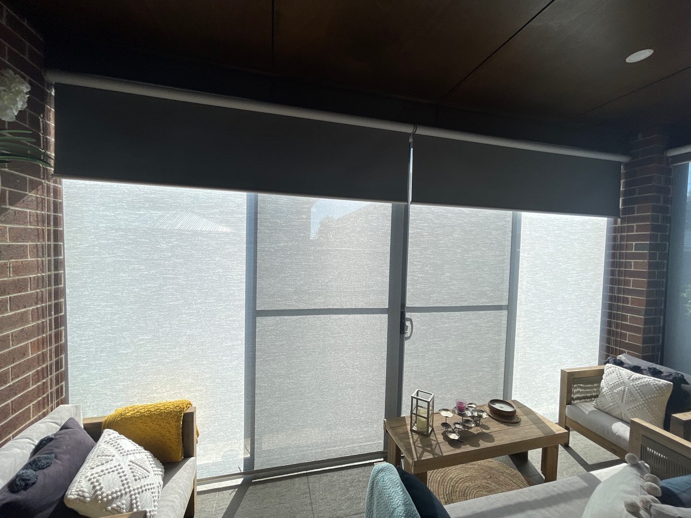 Custom roller blinds installed in a lounge room — Melbourne townhouse