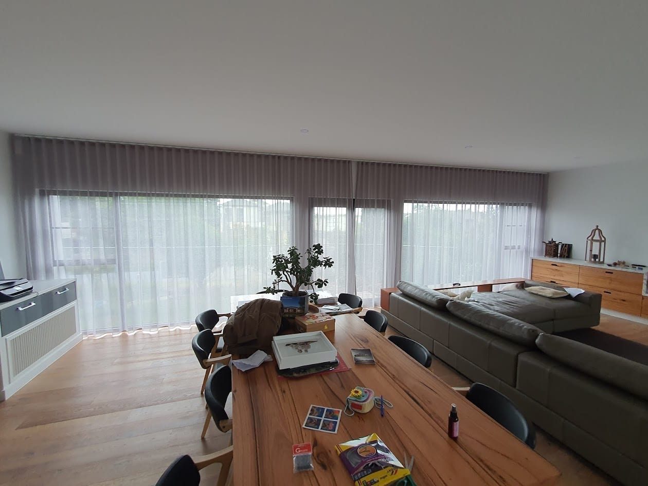 Custom curtains with track system in a Melbourne living and dining room