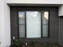 Plantation shutter installation on exterior windows, Melbourne suburb