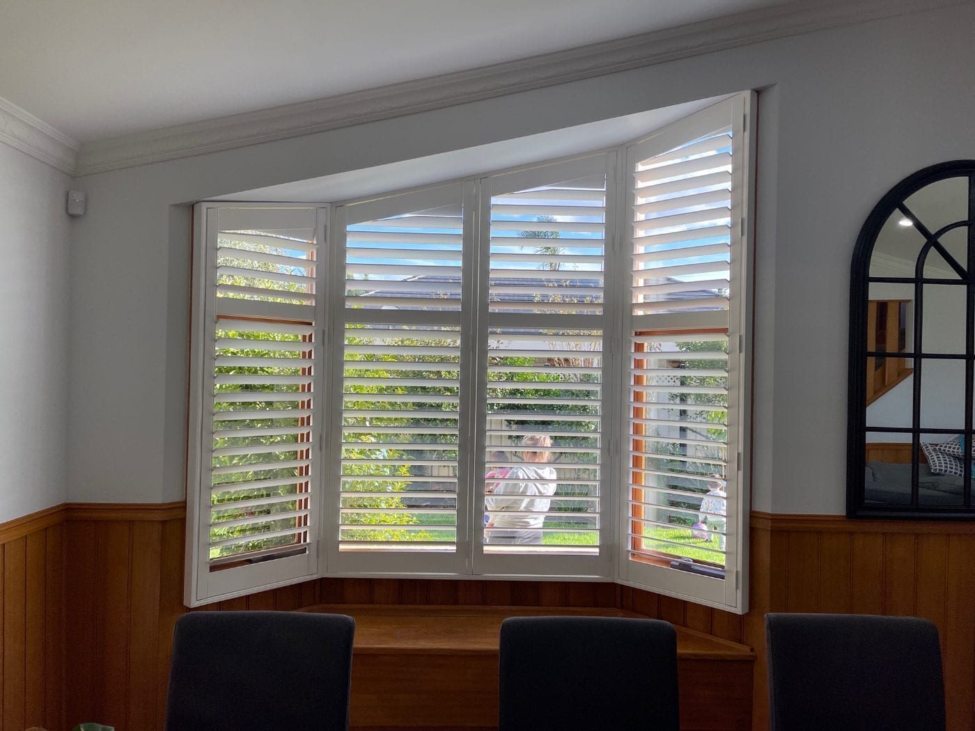 Plantation shutters maximising light control in a Melbourne living room