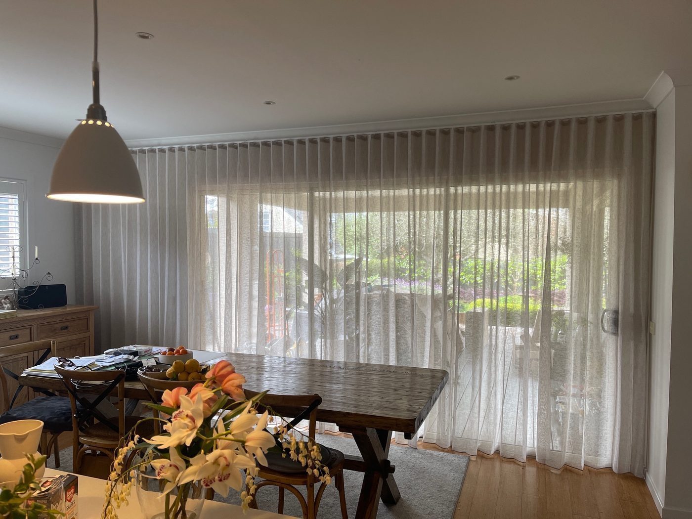 Custom curtains installed in a lounge room — Melbourne house