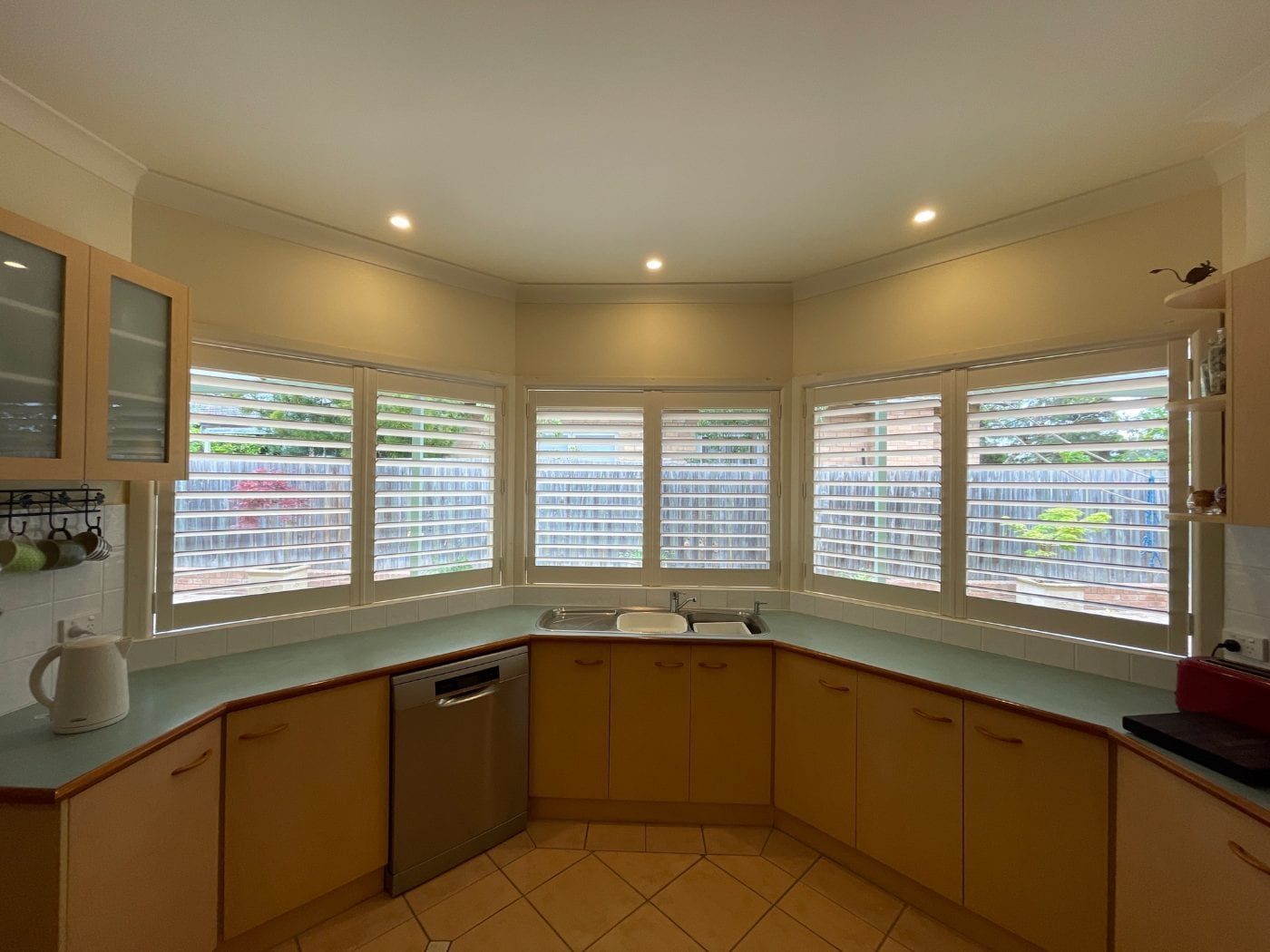 PVC plantation shutters installed in a Melbourne kitchen window