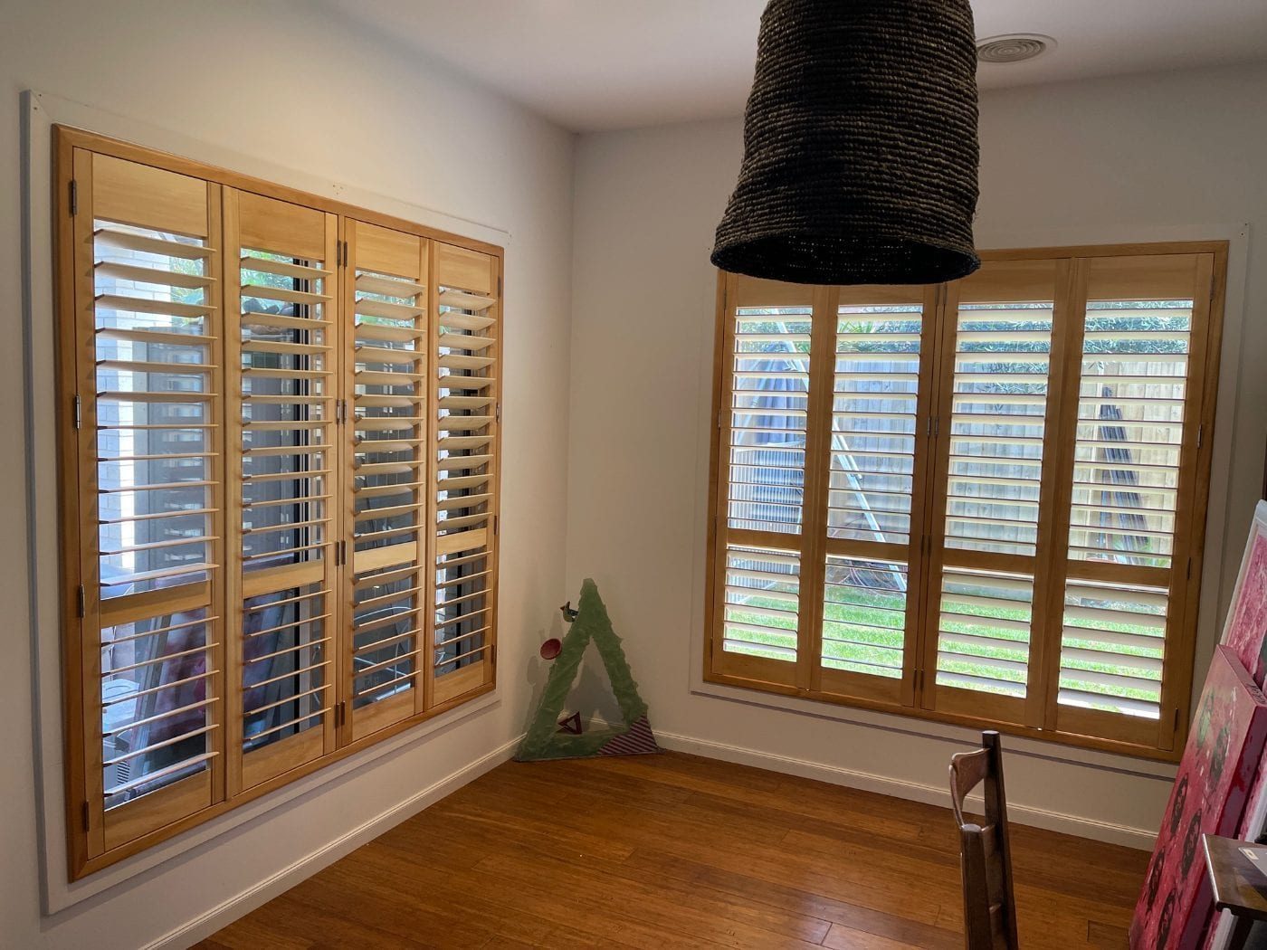 Custom plantation shutters providing privacy in a Melbourne lounge
