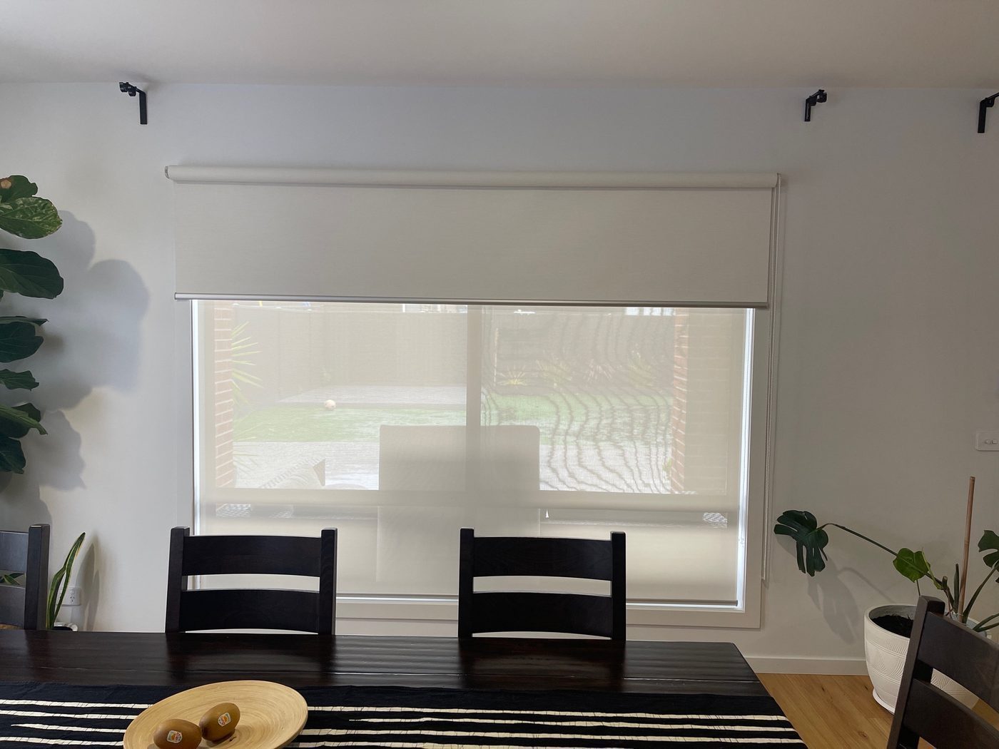 Roller blinds in a dining room — modern Melbourne home