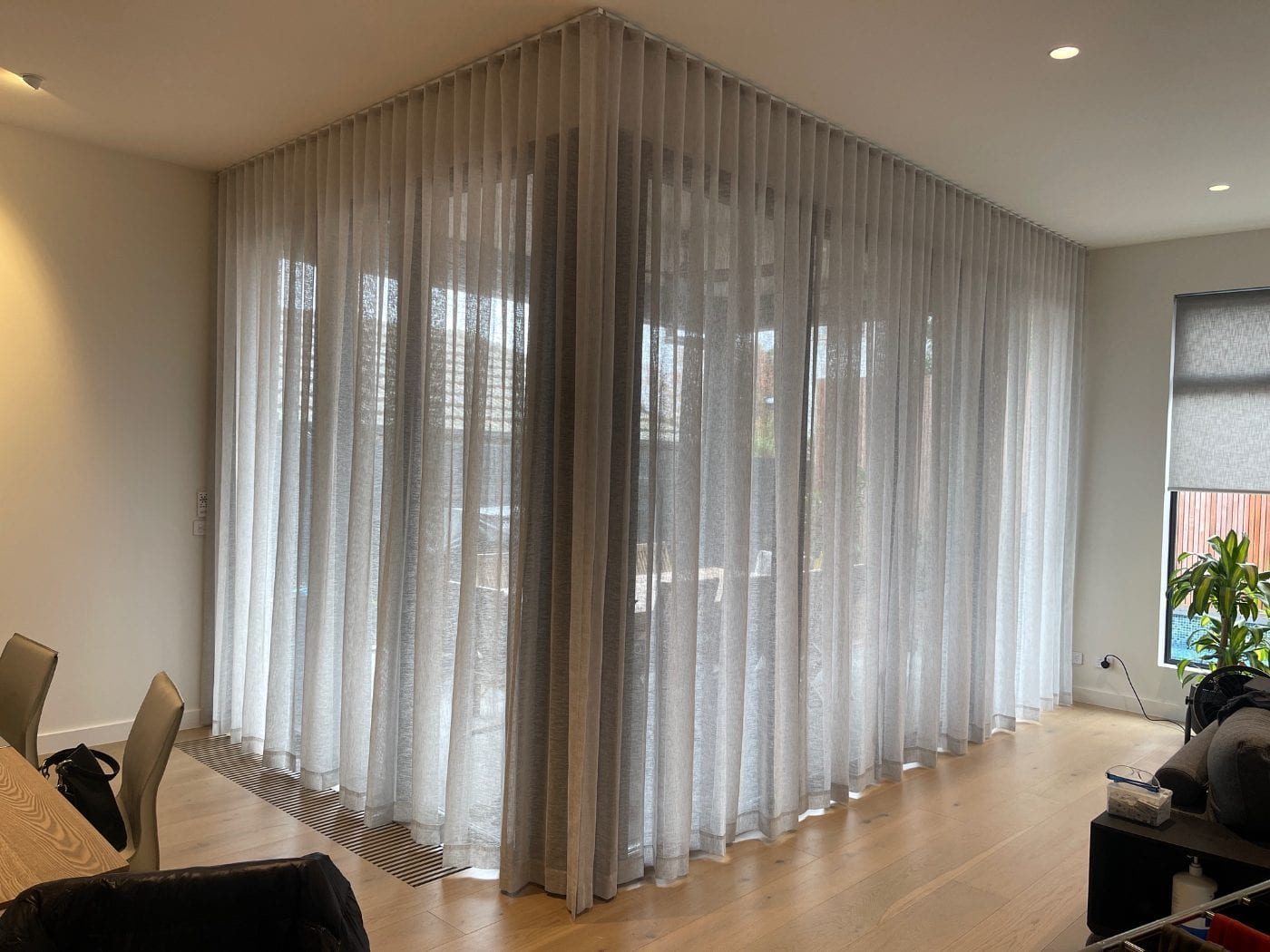 S-fold curtains in a modern Melbourne living area