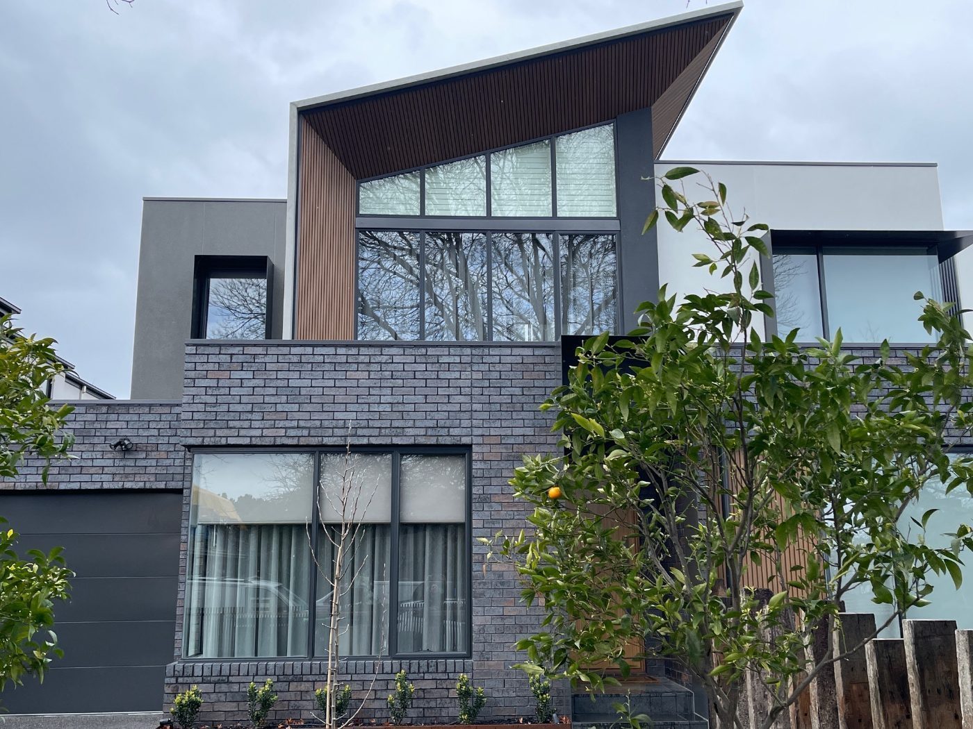 Plantation shutters on exterior bi-fold windows, Melbourne residence