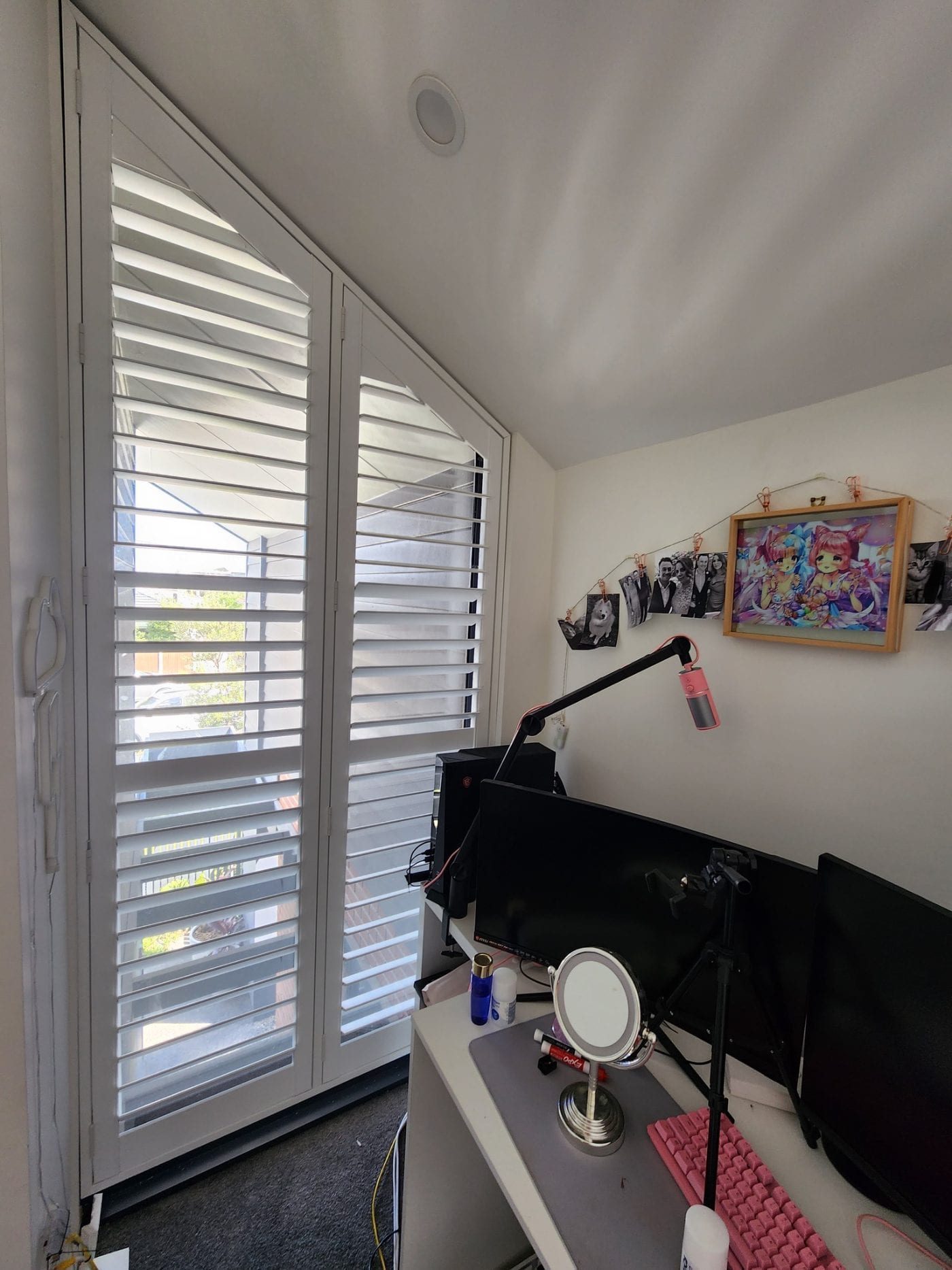 Timber-look plantation shutters in a Melbourne home office