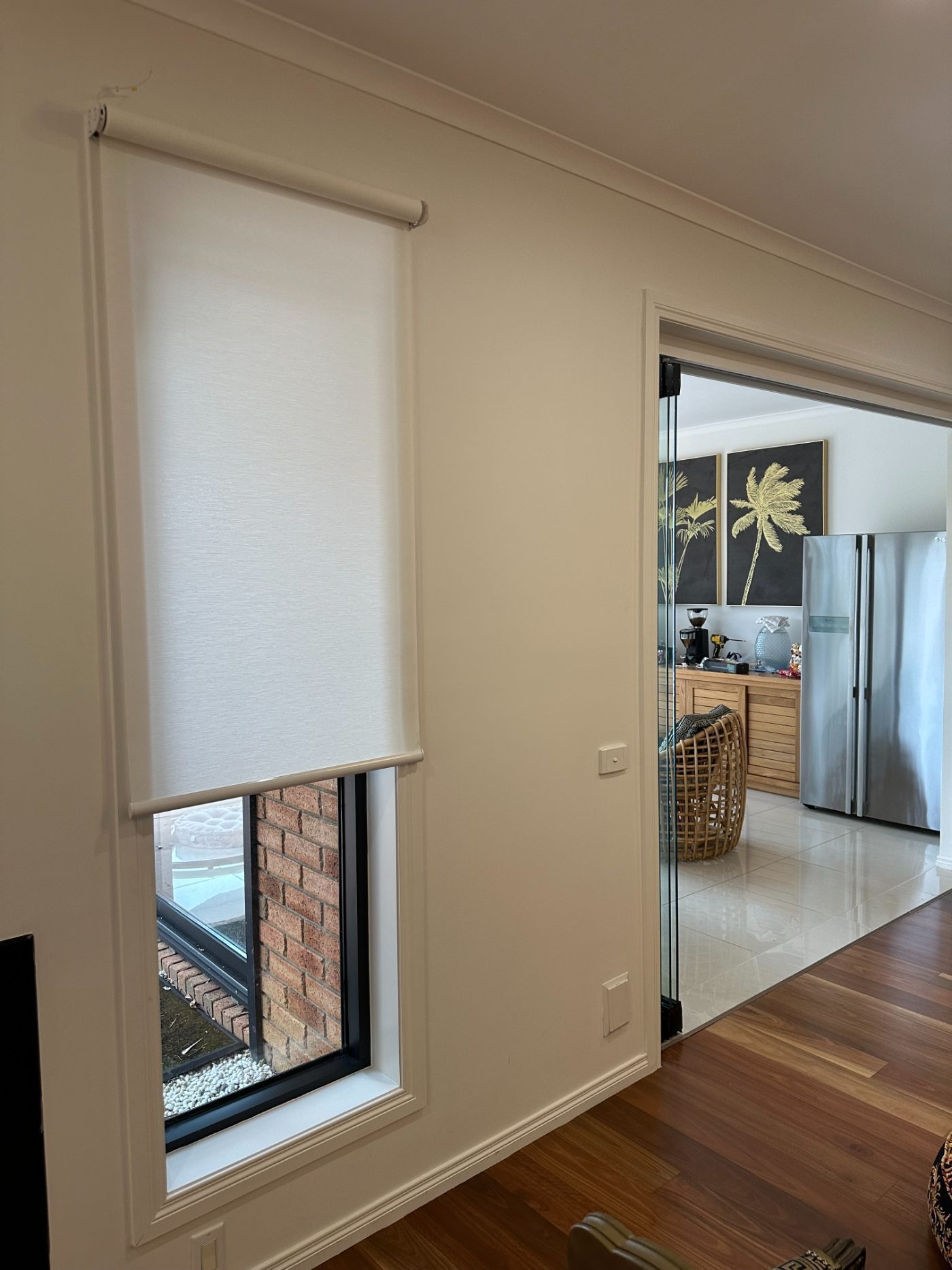 We Inspire motorised roller blinds in a contemporary Melbourne living room