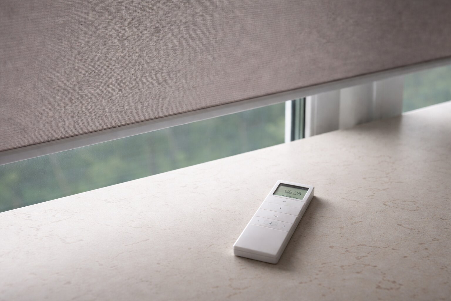 Motorised roller blind with remote control on windowsill Melbourne — We Inspire Blinds