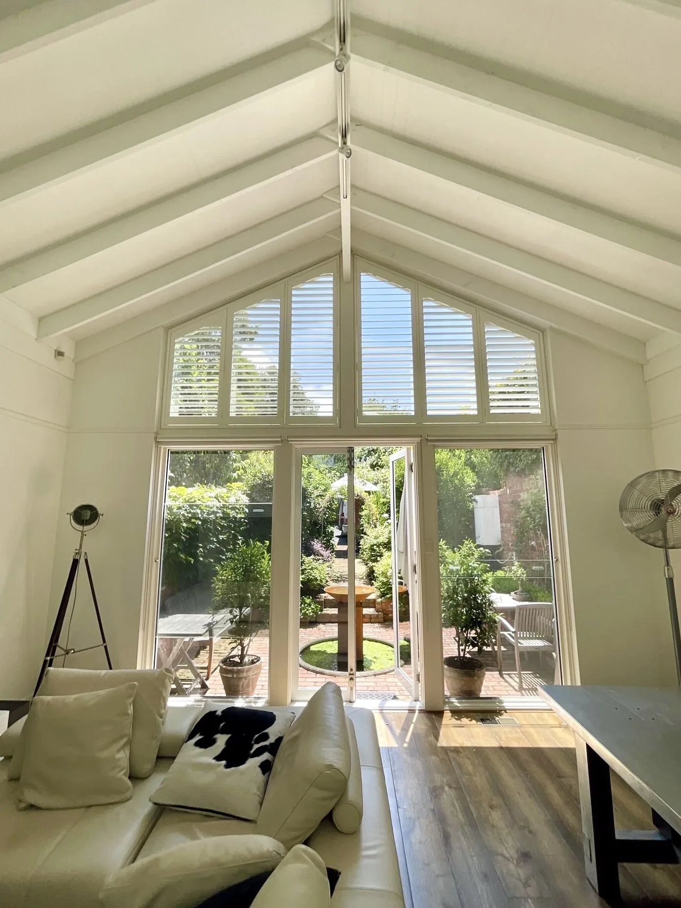 Custom plantation shutters for gable and special shaped windows in Melbourne home — We Inspire Blinds