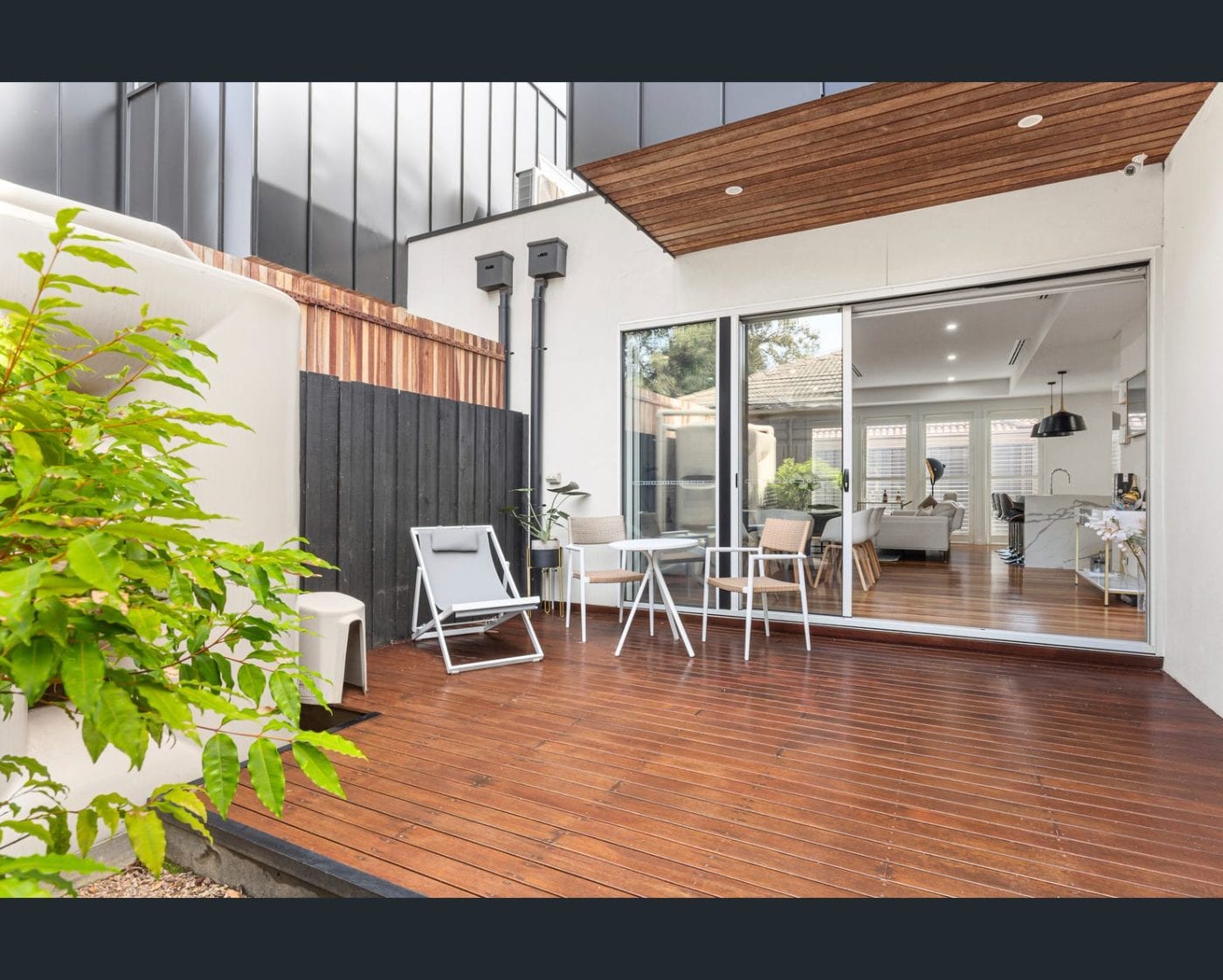 Retractable pleated fly screens on family stacker doors Melbourne