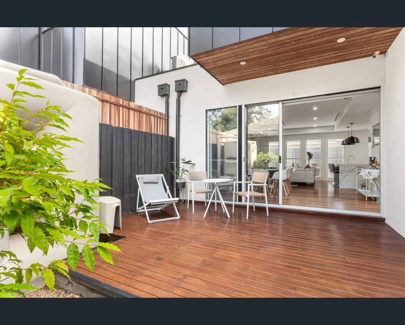 Retractable pleated fly screens on family stacker doors Melbourne