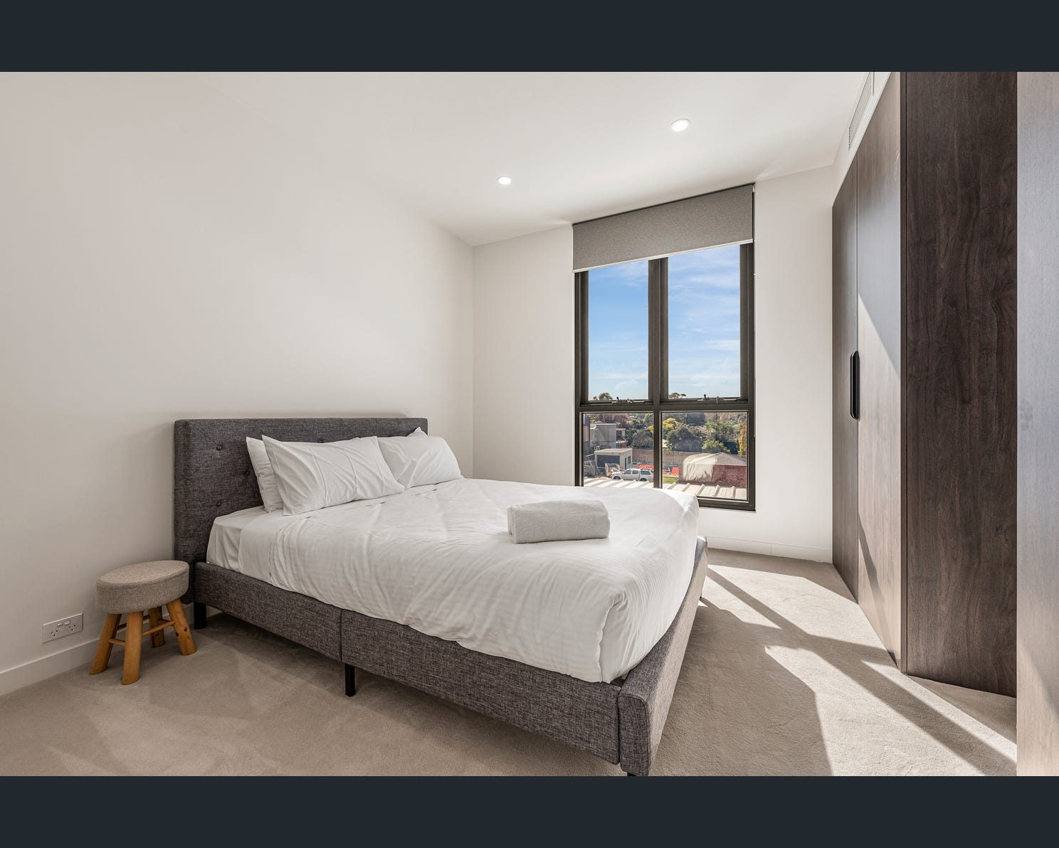 Blockout roller blinds bedroom Hawthorn Melbourne luxury apartment