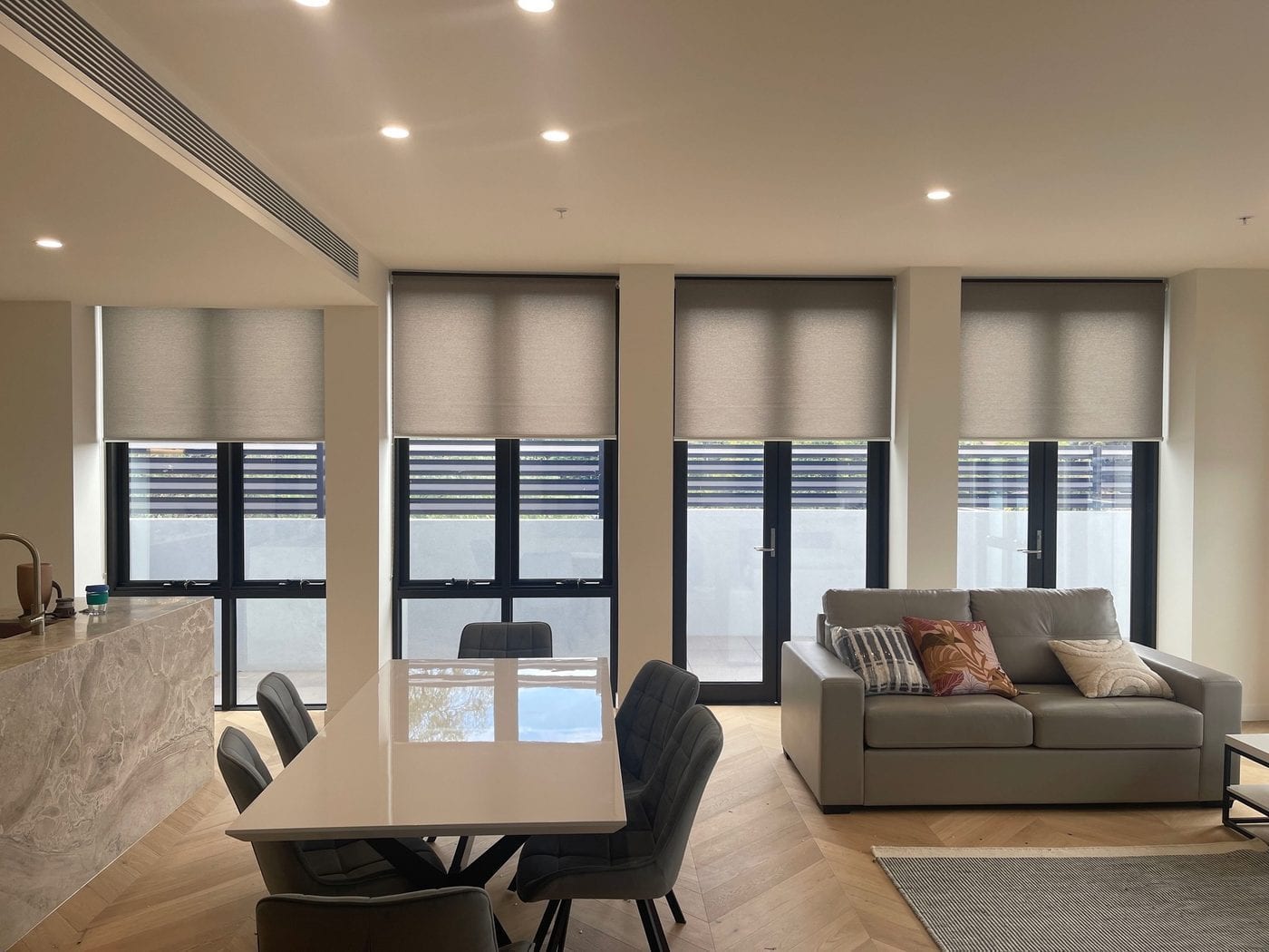 Light filtering roller blinds family living area Hawthorn Melbourne apartment