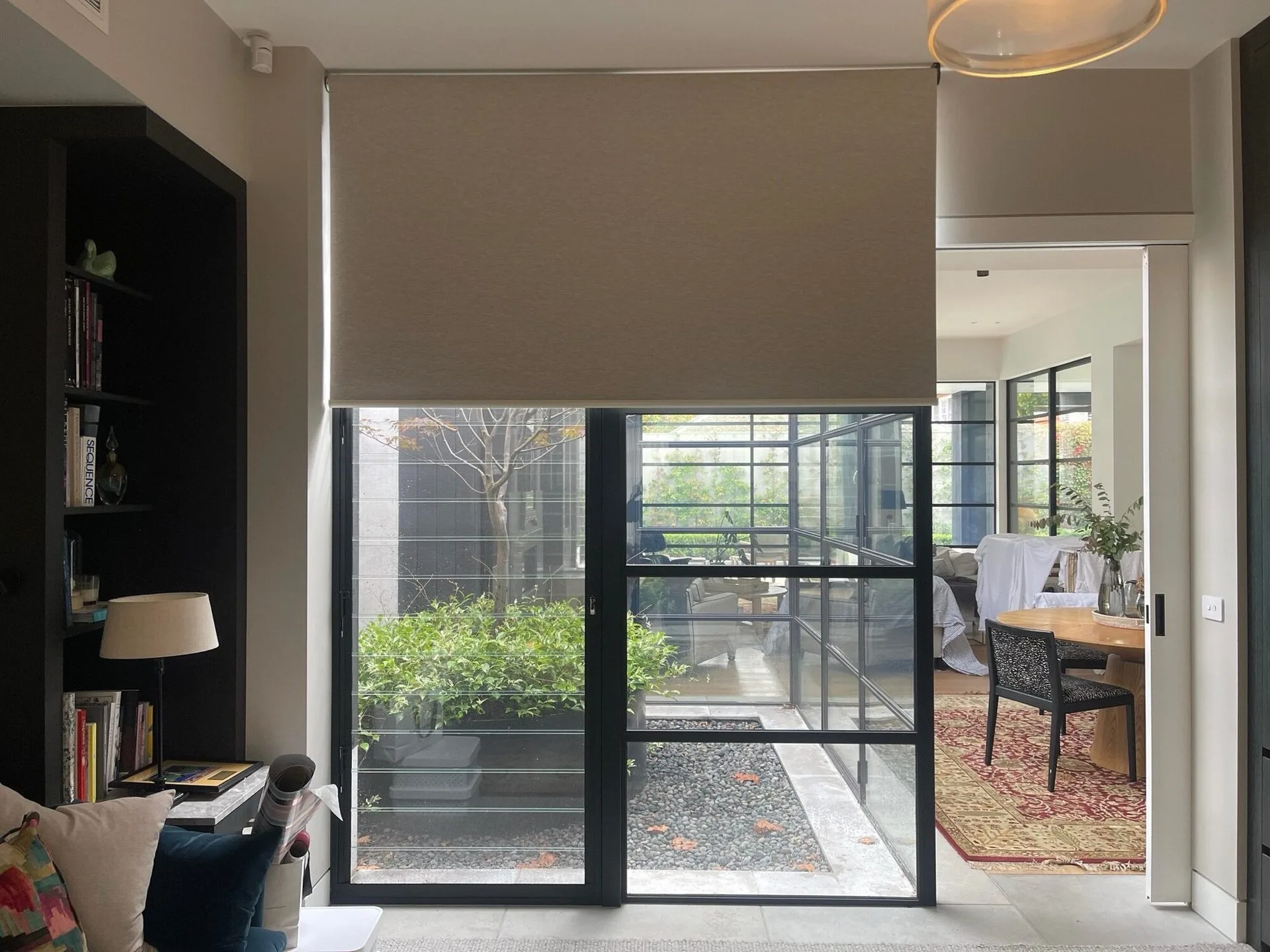 Single roller blockout blind installed in Melbourne living room — We Inspire Blinds